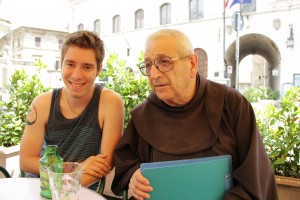 Matteo sharing a drink with Padre GianMaria